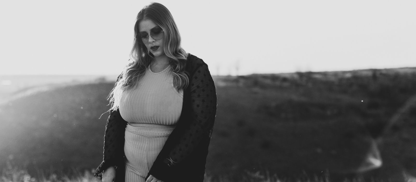 woman looking in mirror self reflection
