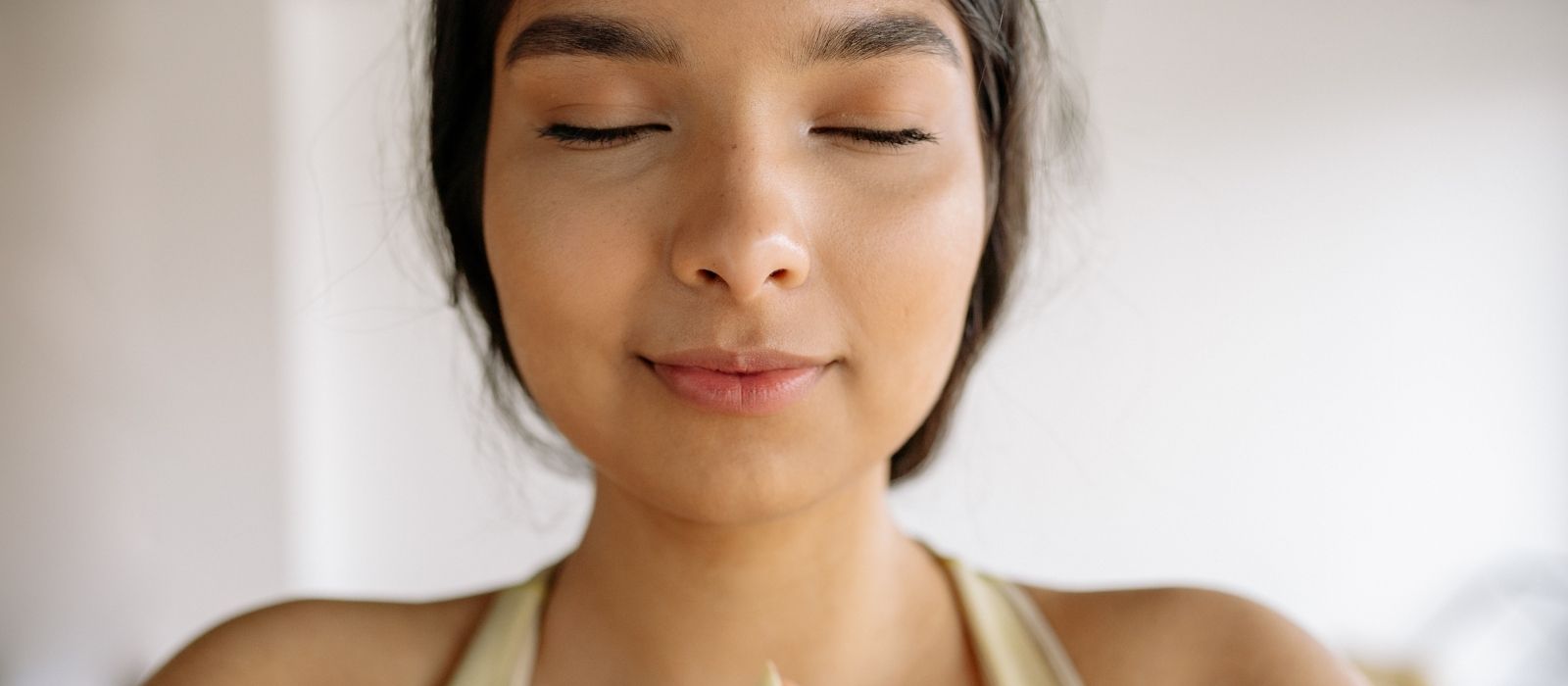Woman with clear radiant skin in natural light