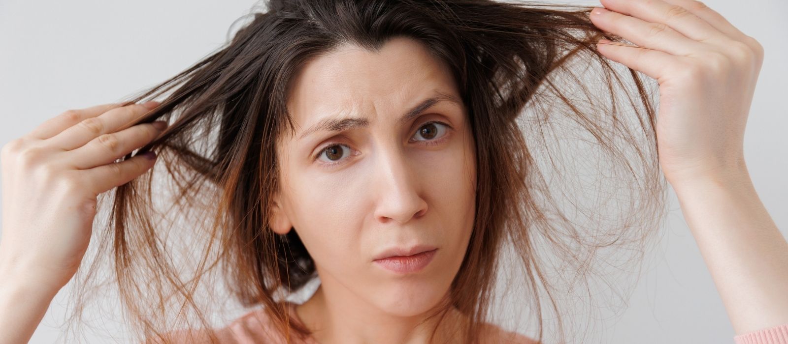 woman hair loss thinning thyroid health