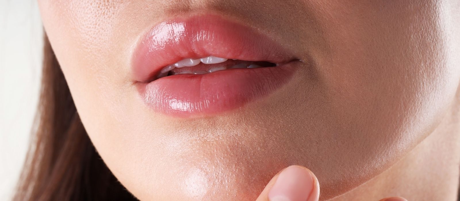 Close up of woman with healthy moisturised lips
