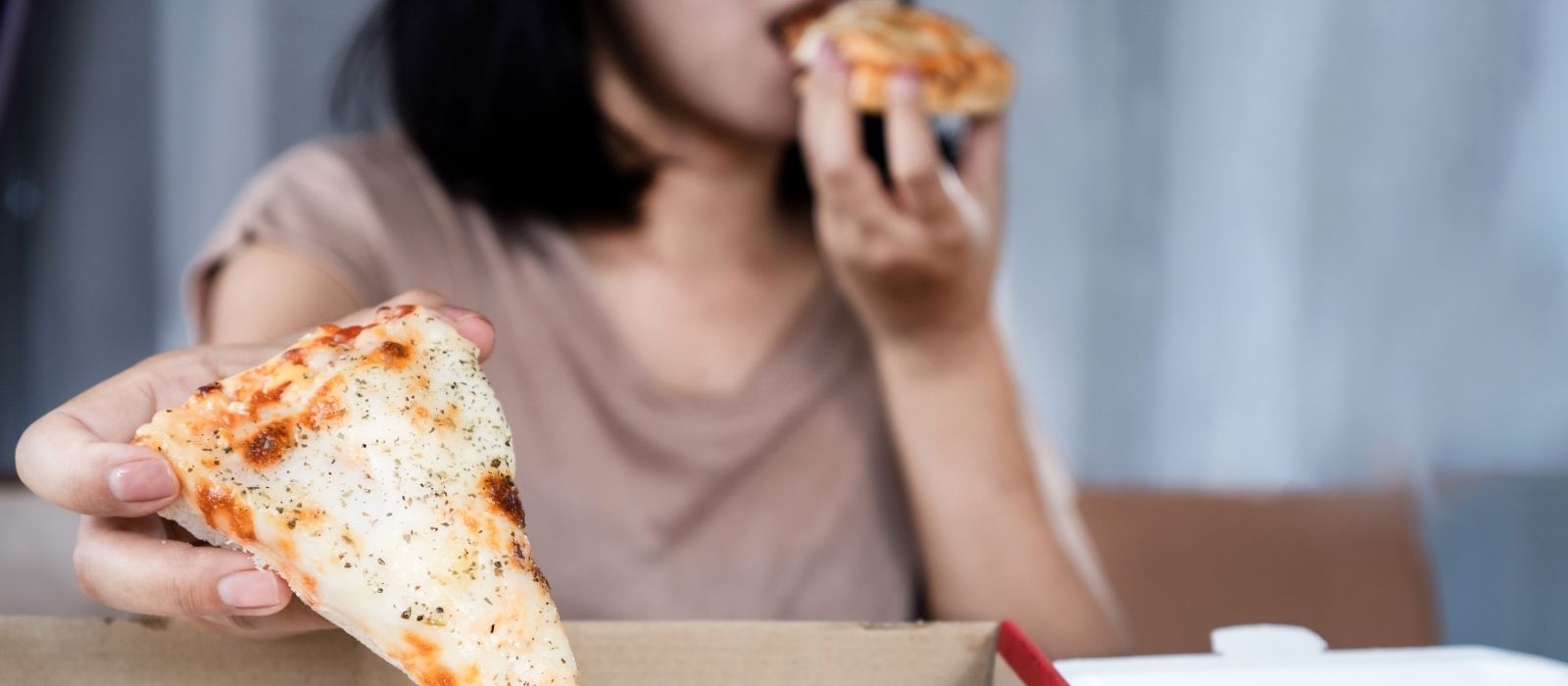 woman eating alone comfort food emotional