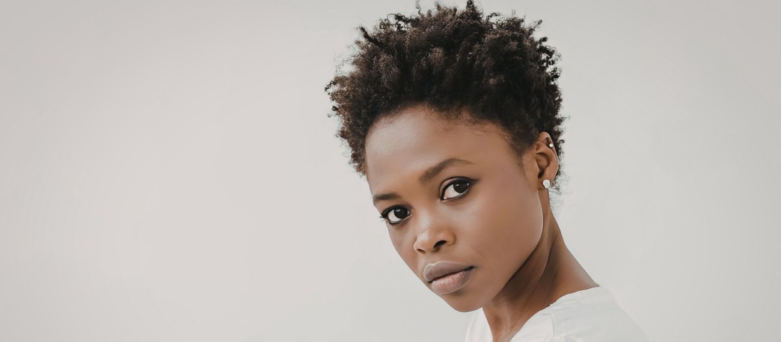 natural hair transition protective style woman