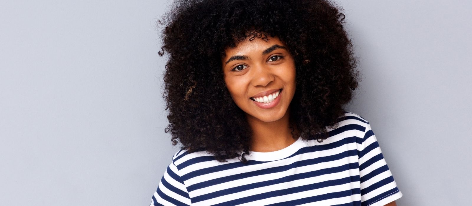 woman hair care routine warm natural light