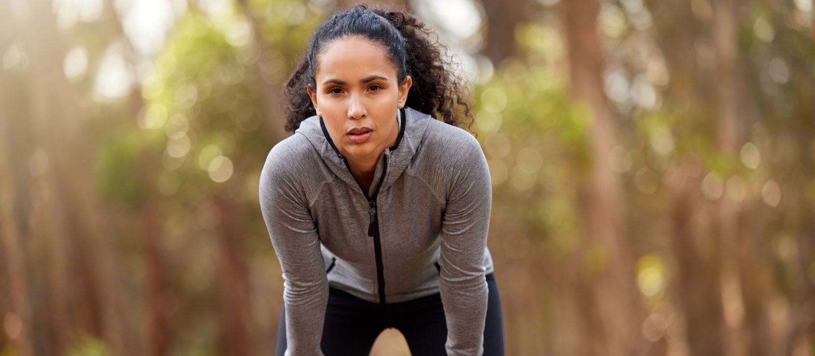 woman contemplating future direction path