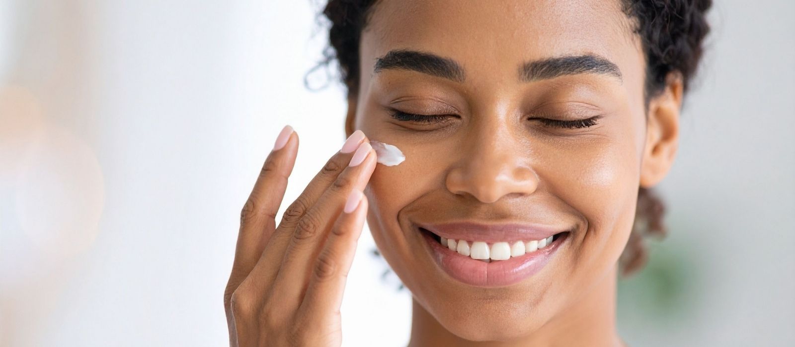 Skincare serums and ingredients on a clean surface