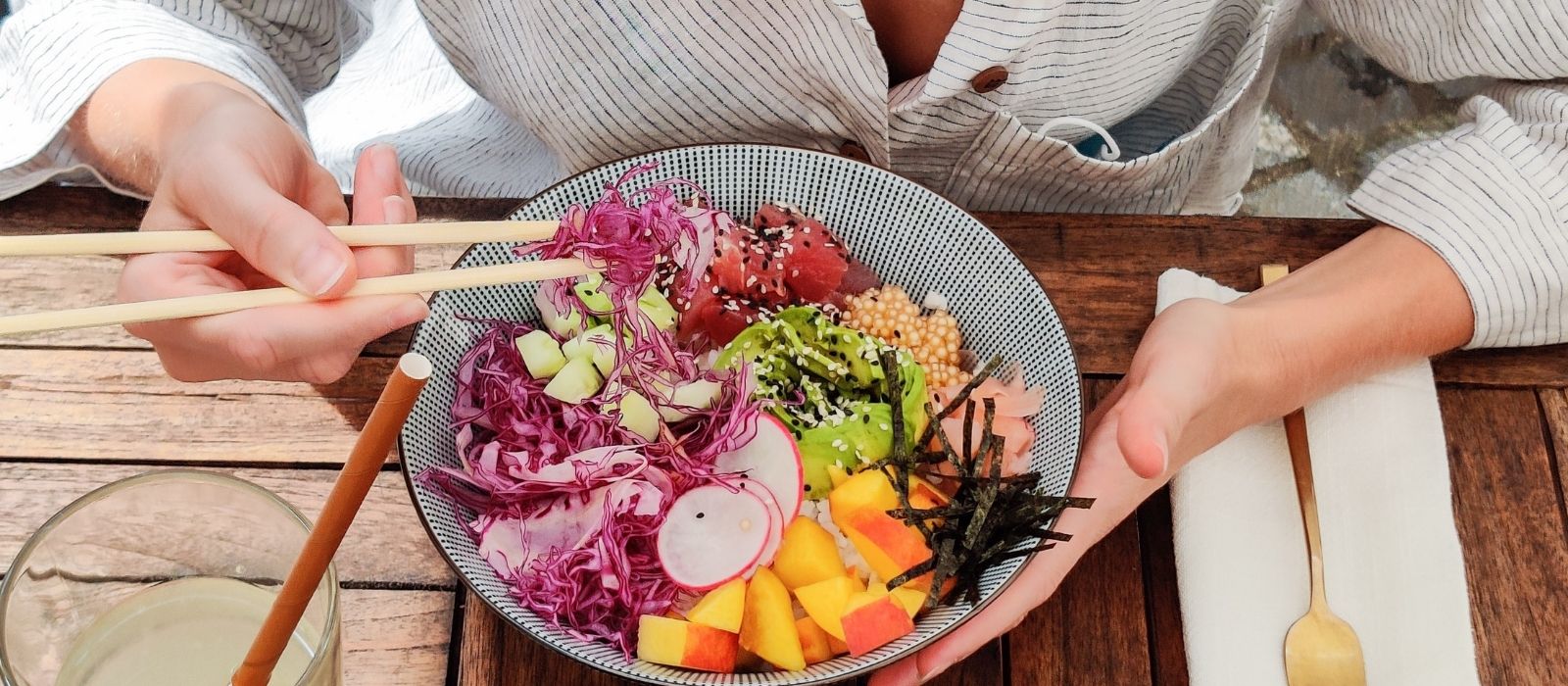 woman eating mindful warm light natural kitchen