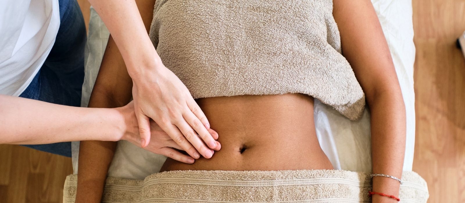 woman massage face calm warm natural light