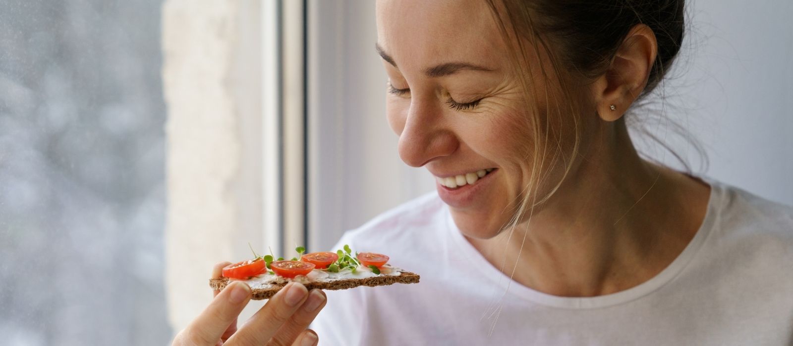 woman supplements morning warm light natural