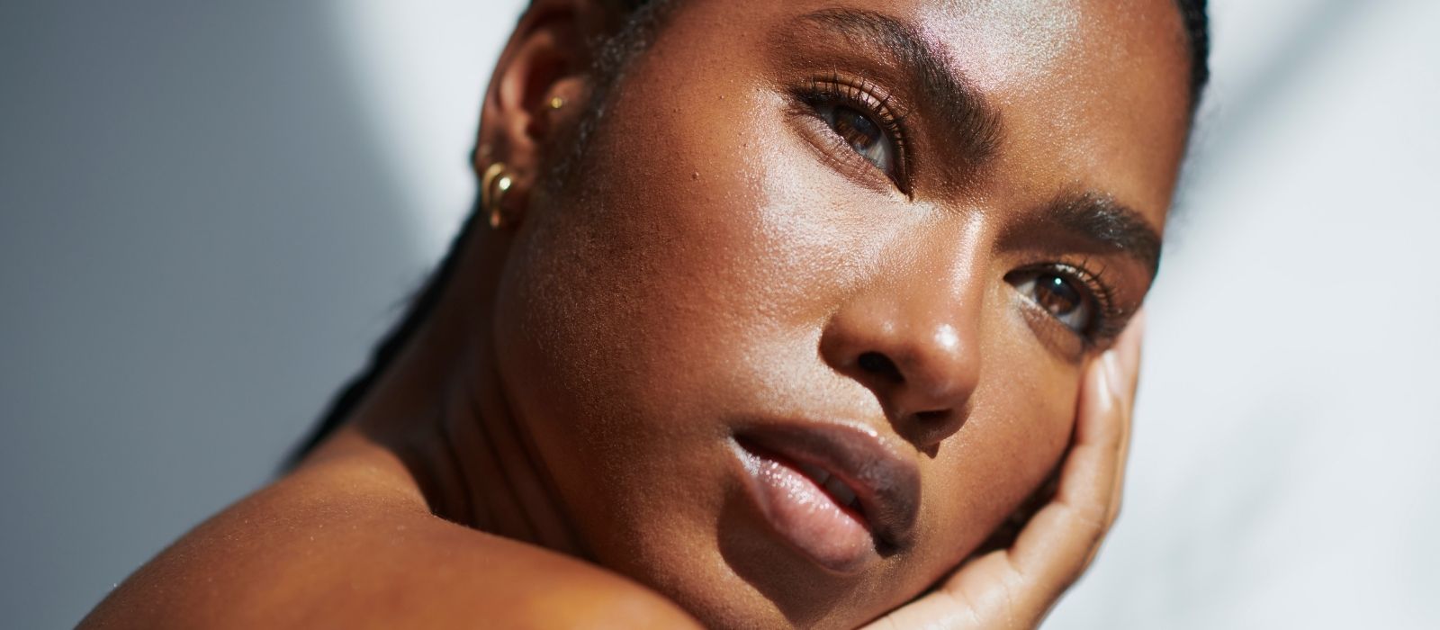 Woman with radiant skin in soft natural light