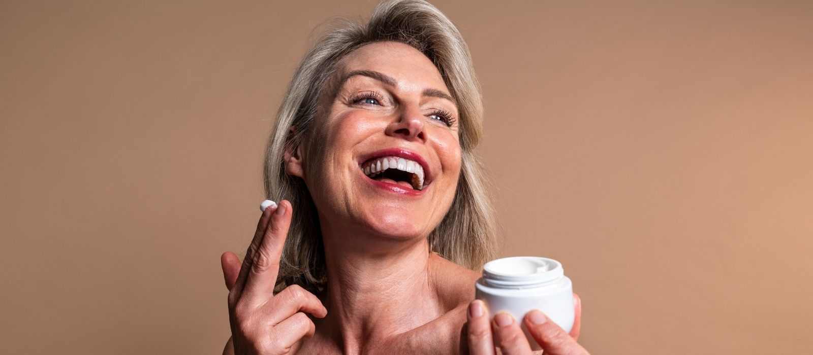 Woman with glowing skin in warm natural light
