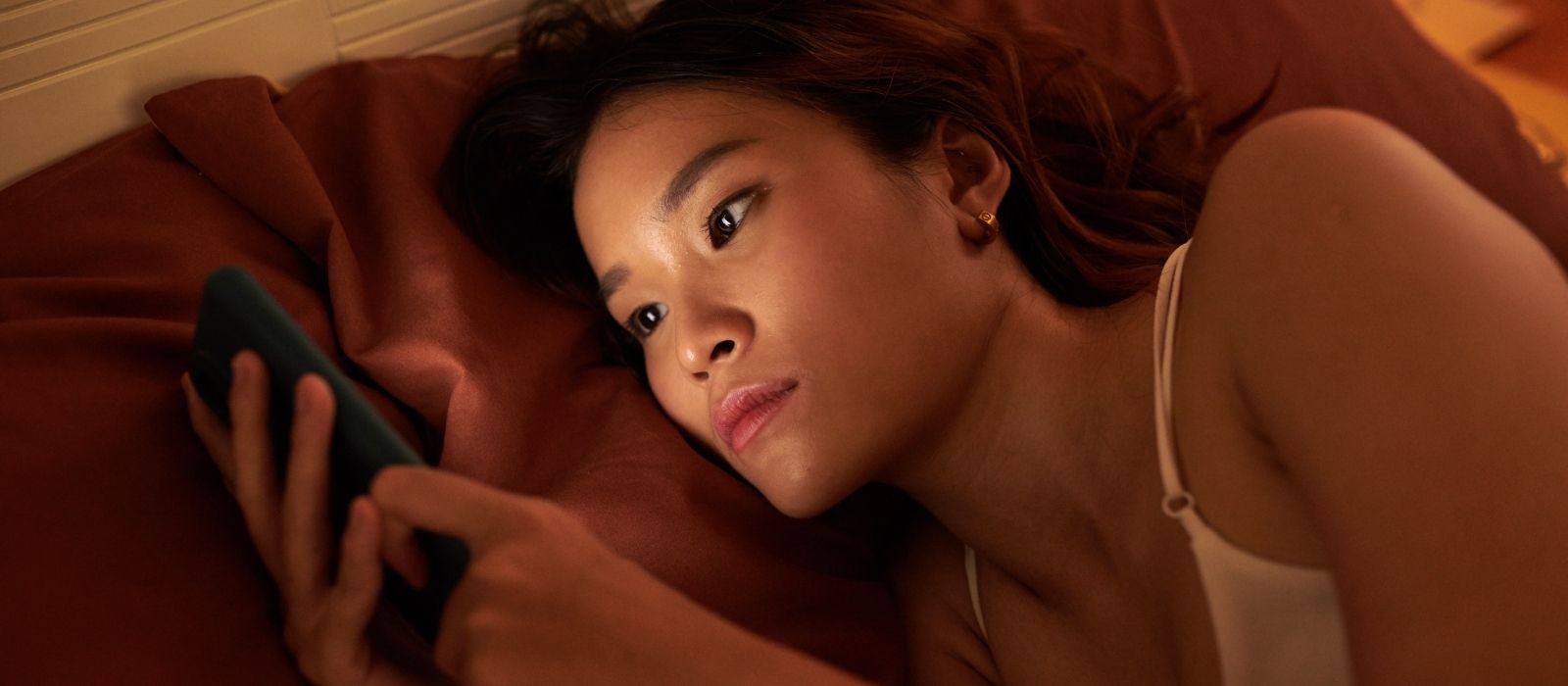 woman calm phone warm soft interior light