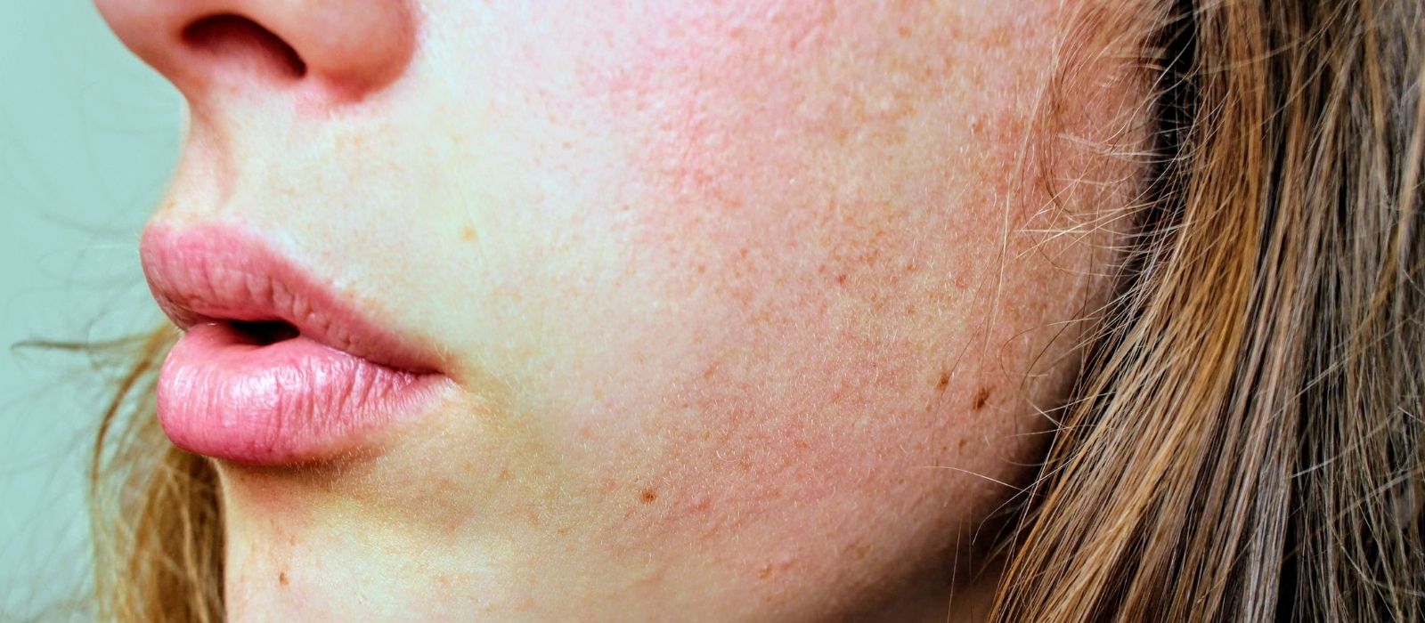 woman calm face soft light natural skin