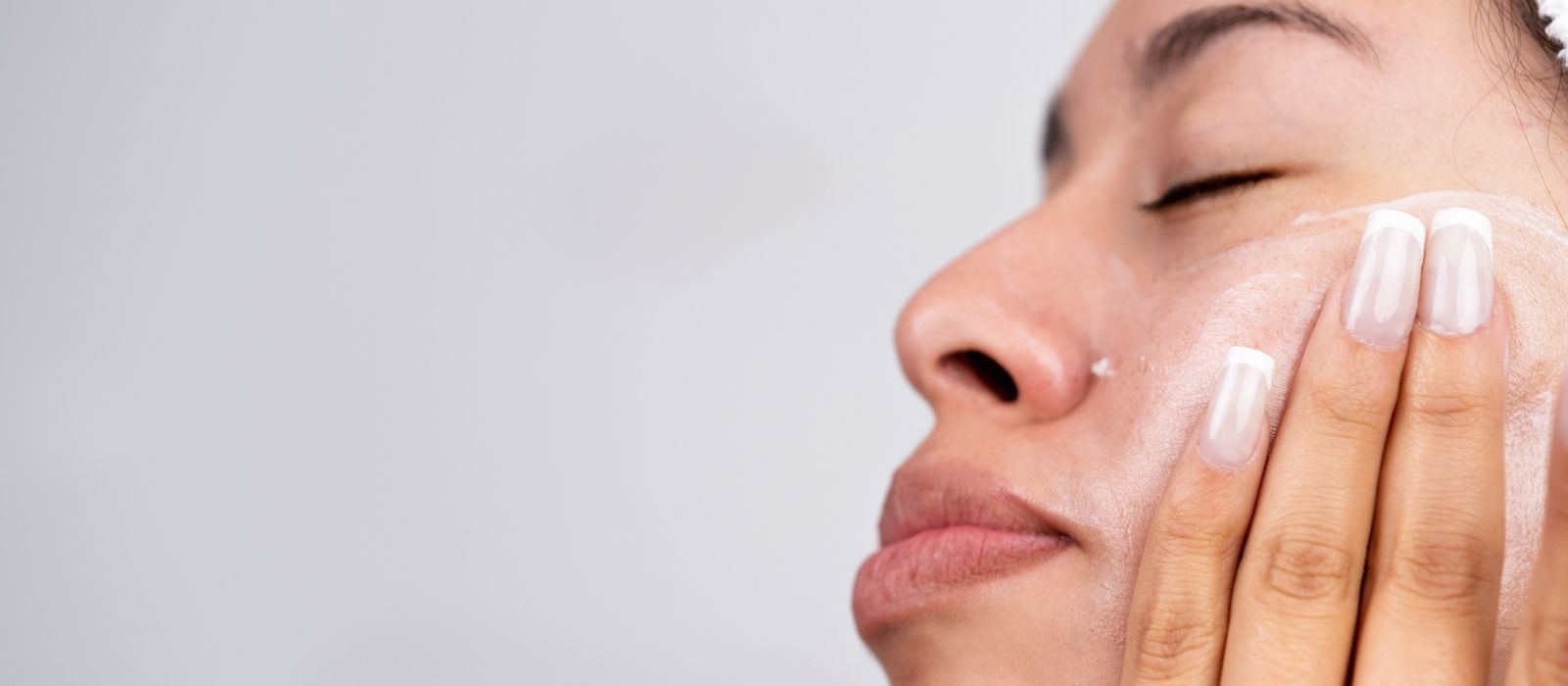 Woman with glowing skin in warm natural light