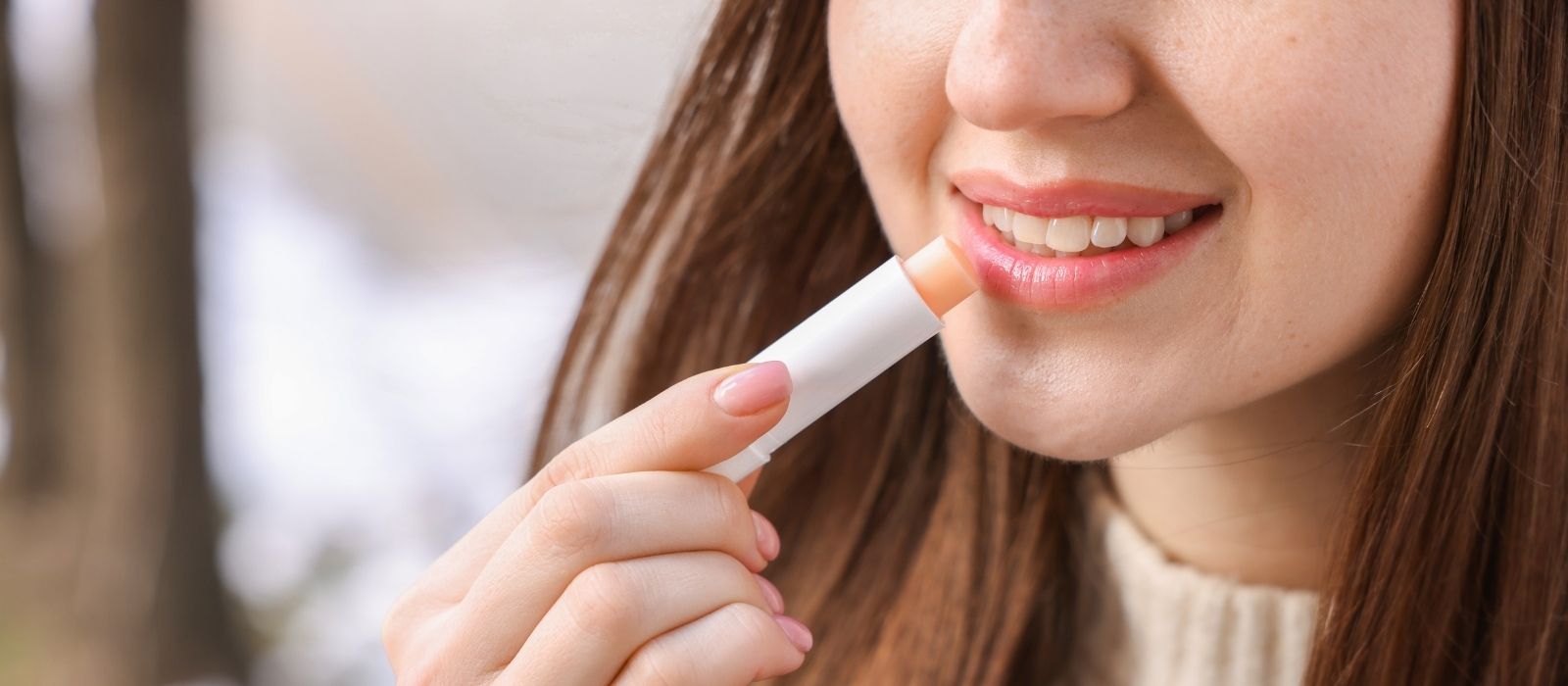 Close up of woman with healthy moisturised lips