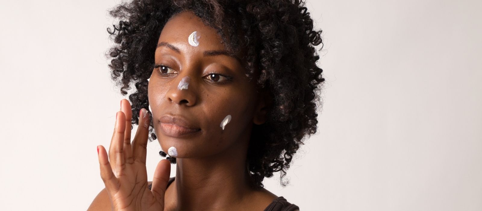 dark skin woman skincare hyperpigmentation treatment