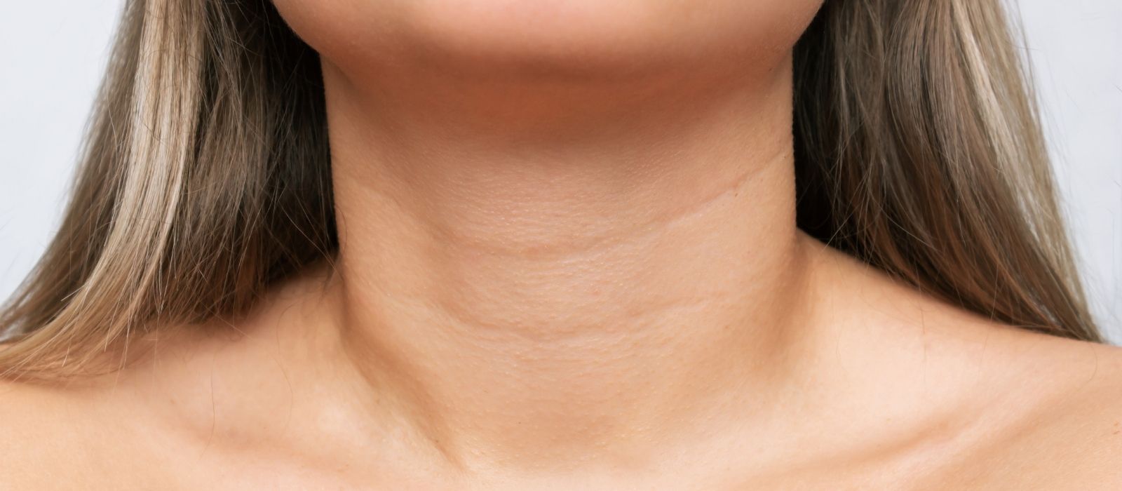 woman neck decolletage skincare moisturising