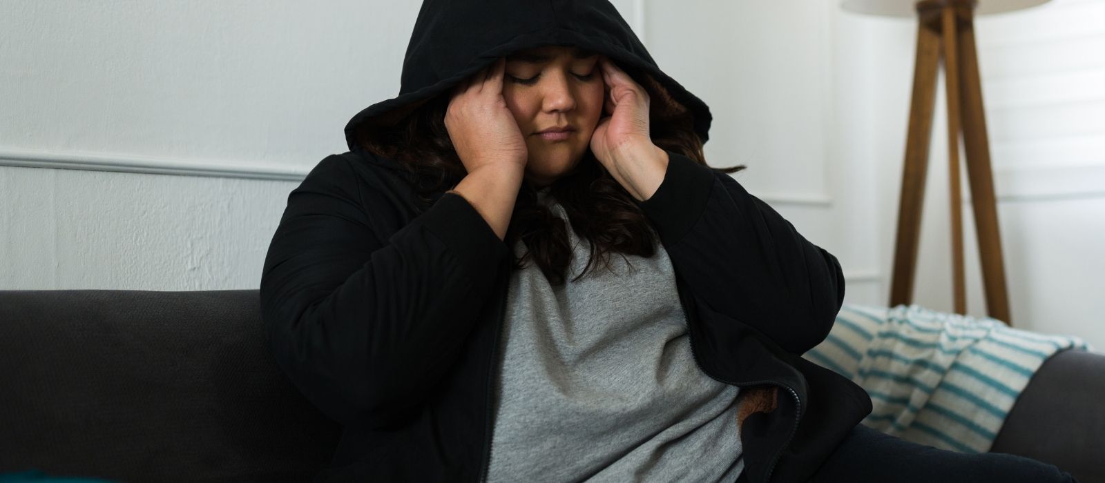 woman alone sitting quietly solitary