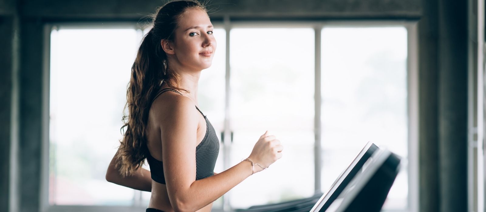 woman walking jogging low intensity cardio outdoors
